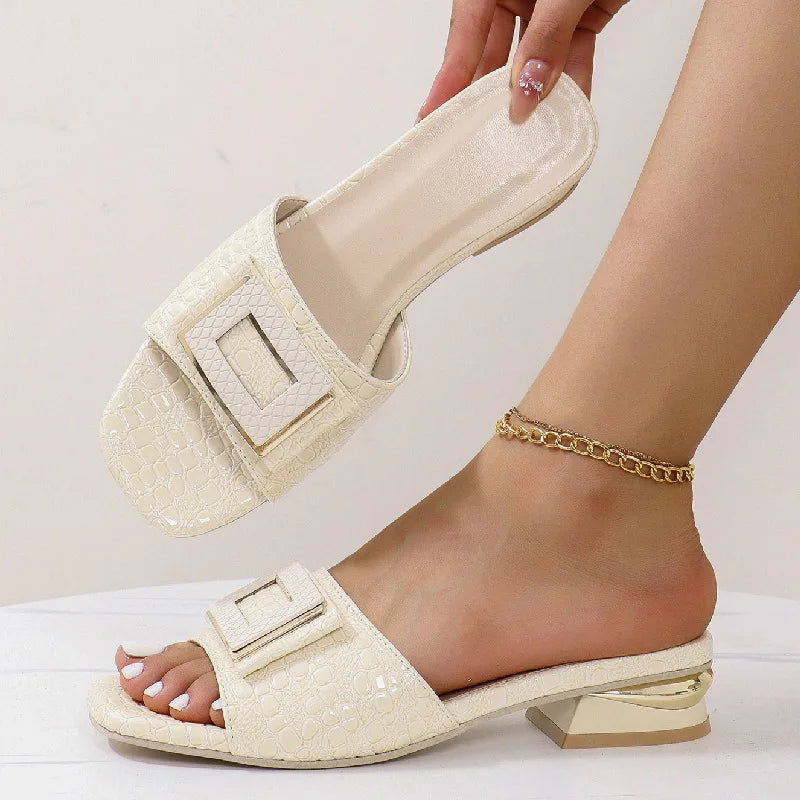EtherealBe fashion low heel open toe mules in cream with decorative buckle detail