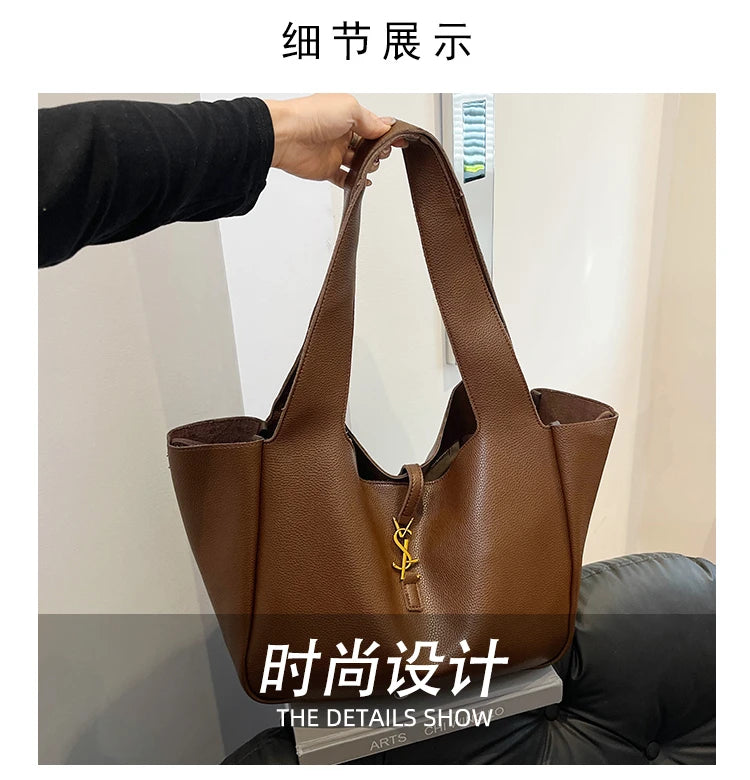 Stylish brown leather fashionable tote bag for women with spacious interior and elegant design