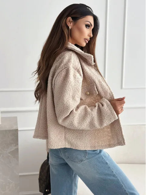 Fashionable woolen short coat for women in beige, styled with light blue jeans for a chic look