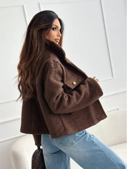 Fashionable woolen short coat for women in brown, styled with relaxed jeans and a chic look