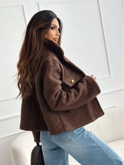 Fashionable woolen short coat for women in brown, styled with relaxed jeans and a chic look