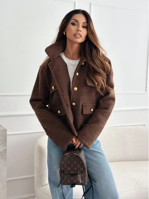 Fashionable woolen short coat for women in brown with large buttons and pockets, styled with denim