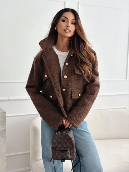 Fashionable woolen short coat for women in brown with large buttons and pockets, styled with denim