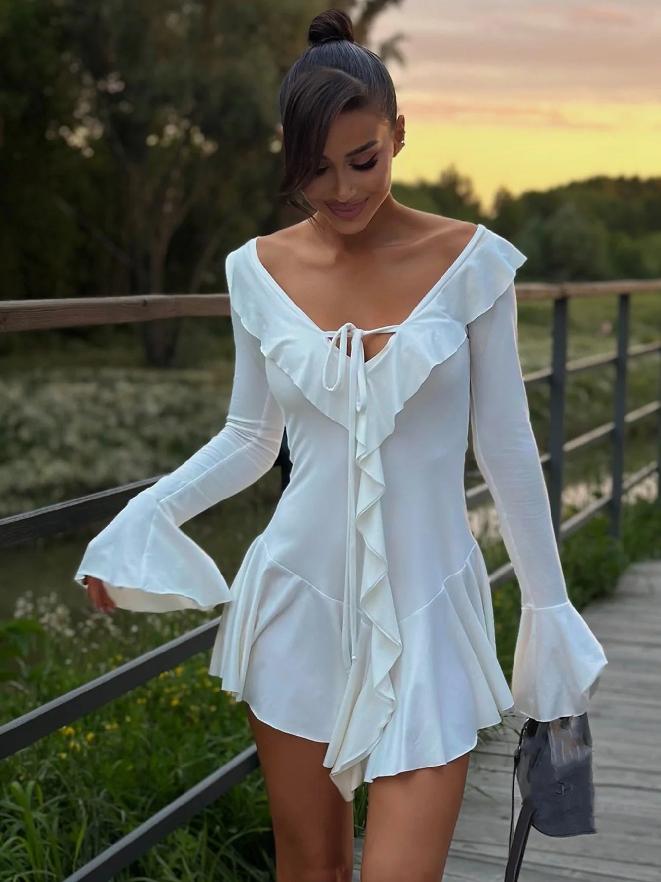 EtherealBe Flared Sleeved V Neck Ruffle Dress in White with Front Tie Detail for Stylish Looks