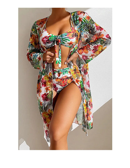 Floral print bikini set with sarong featuring vibrant tropical flowers and a stylish cover-up
