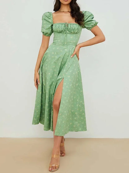Elegant green floral print maxi dress with puff sleeves and thigh-high slit for summer occasions