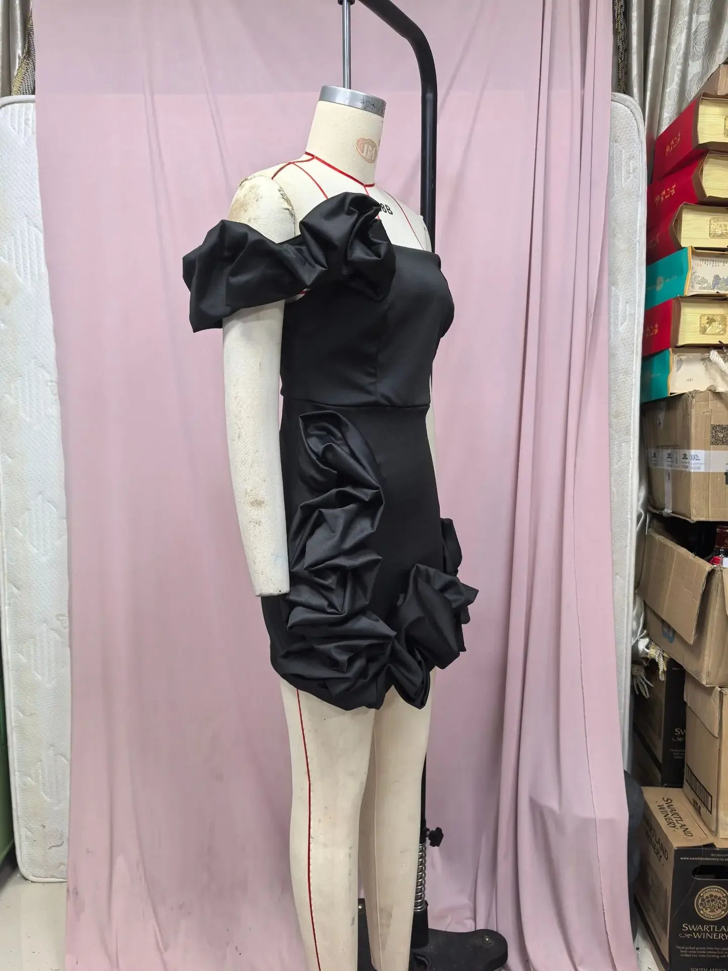 Black EtherealBe formal strapless cocktail dress with ruffled detailing and fitted silhouette