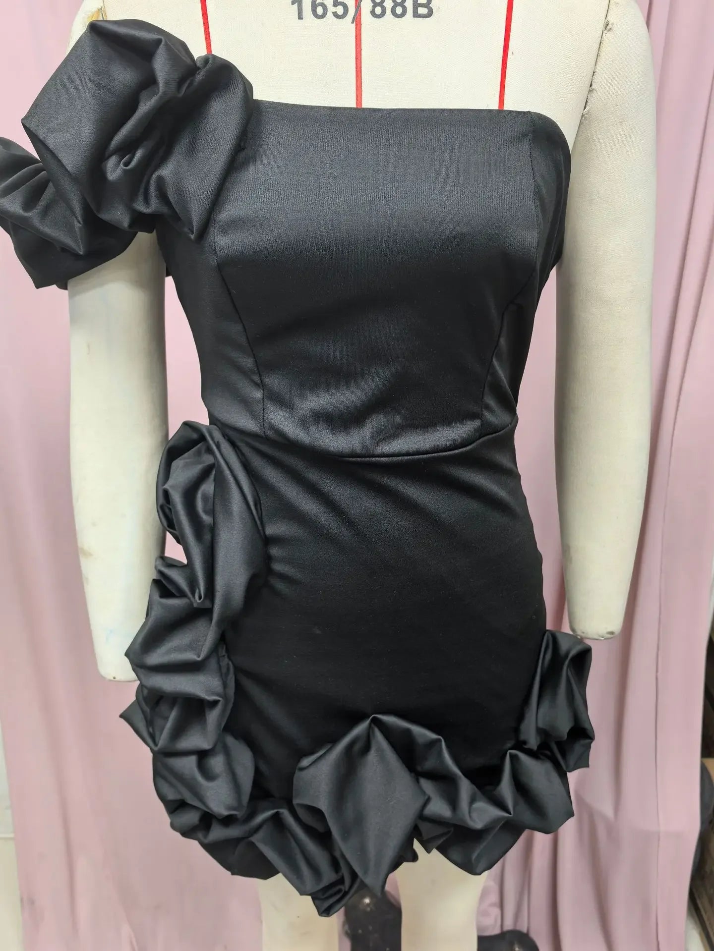 EtherealBe formal strapless cocktail dress in black with ruffle details and one shoulder embellishment