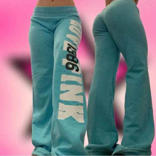 EtherealBe turquoise flared sweatpants with bold white side logo low rise front and back view American vintage flare sweatpants