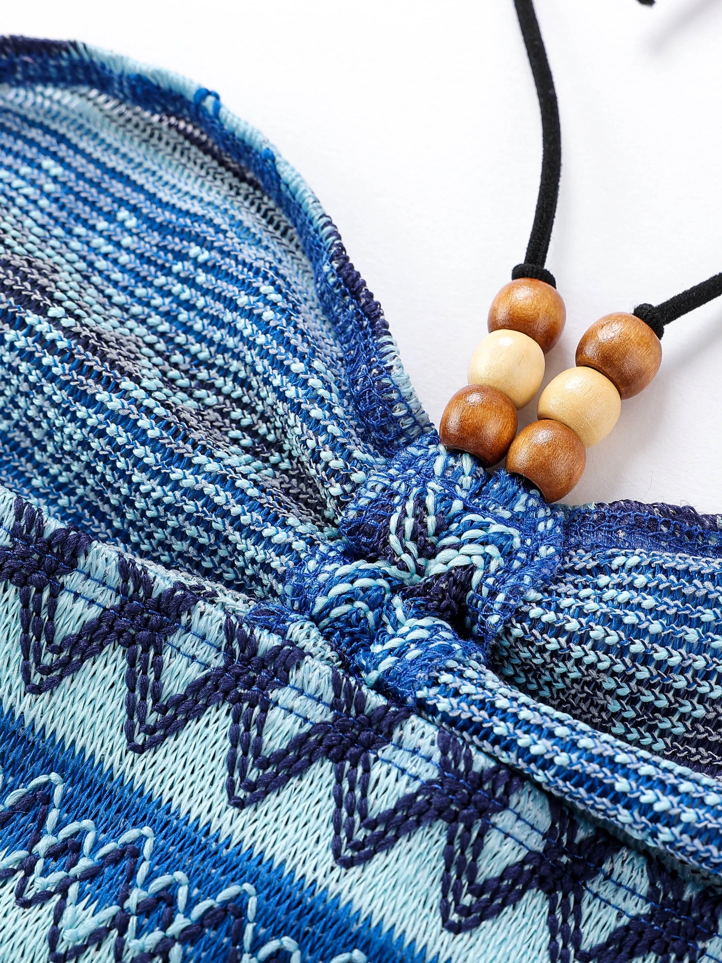 EtherealBe geo pattern beaded halter crop top featuring a unique blue and teal design with wooden beads