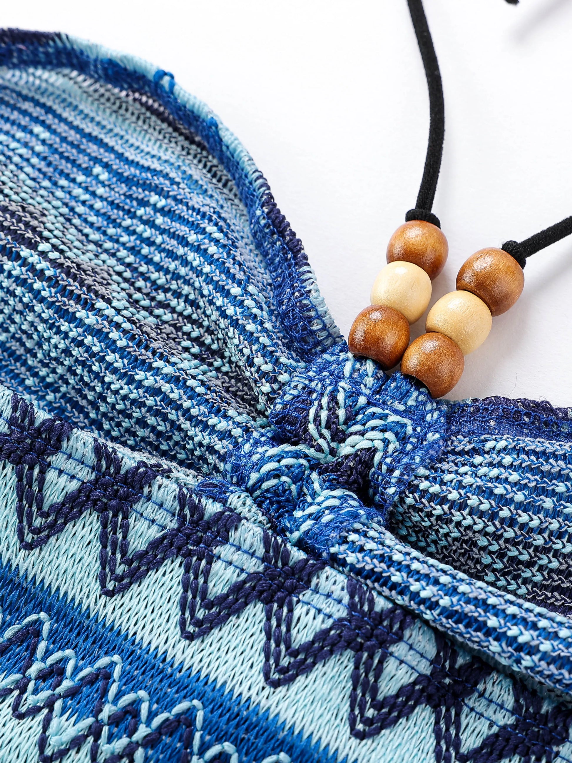 EtherealBe geo pattern beaded halter crop top featuring a unique blue and teal design with wooden beads