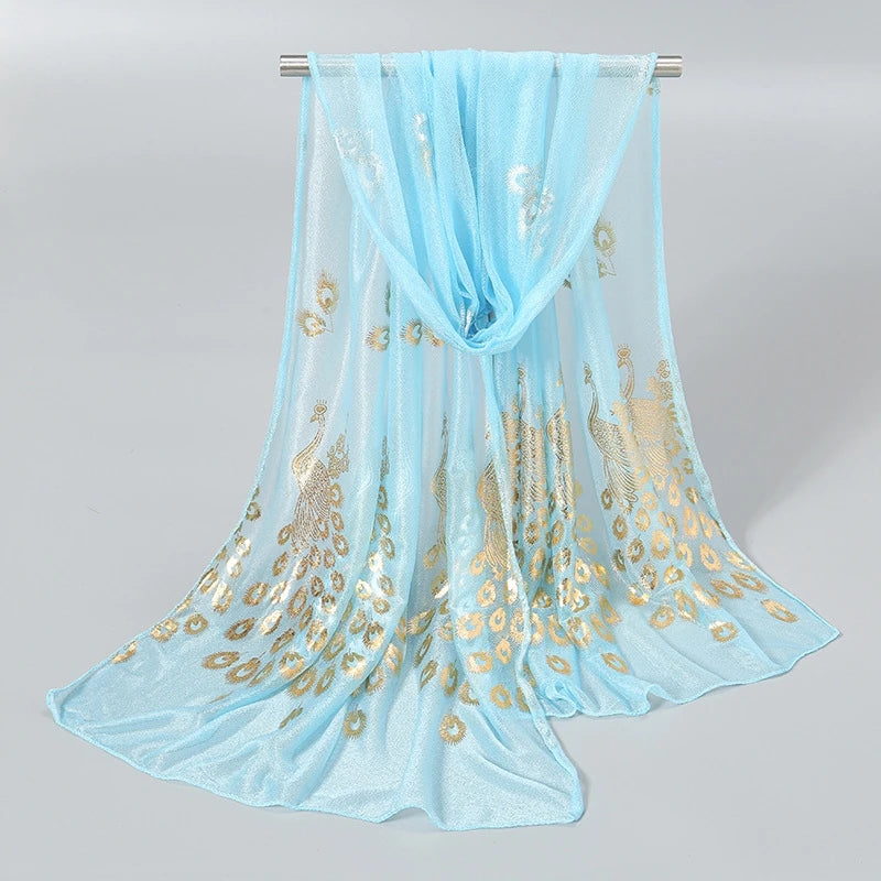 EtherealBe gold stamped peacock scarf in blue with elegant peacock design and shimmering details