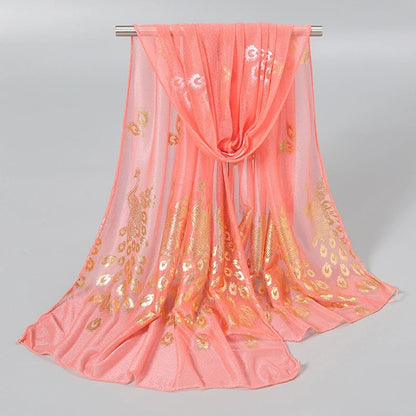 EtherealBe gold stamped peacock scarf in coral color with intricate peacock designs for a stylish look