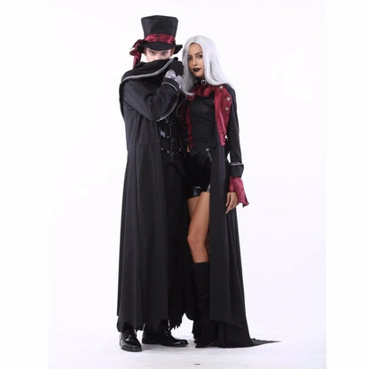 Gothic vampire couple Halloween costume featuring elegant attire and dramatic accessories