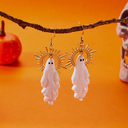 EtherealBe Halloween ghost earrings with white ghost charms and gold sunburst accents