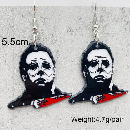 EtherealBe Halloween horror earrings featuring a classic masked character with a knife design