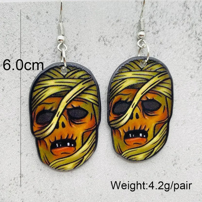 EtherealBe Halloween horror earrings featuring vibrant skull design with mummy wrapping