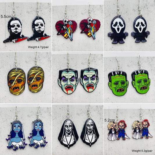 Assorted Halloween horror earrings featuring spooky designs like masks and monsters for festive accessorizing