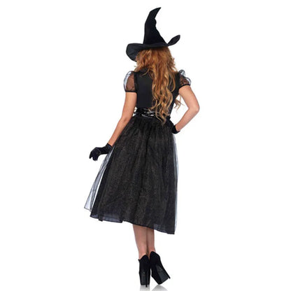 Elegant Halloween witch costume featuring a sheer black dress and a tall pointed hat