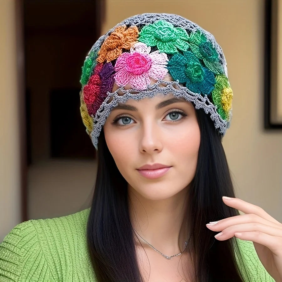 Colorful hand-knitted bohemian style beanie with floral design, perfect for adding a vibrant touch