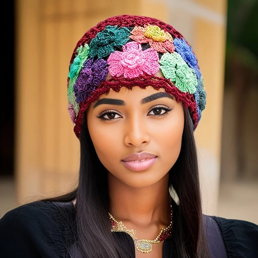 Colorful hand-knitted bohemian style beanie featuring floral patterns and vibrant colors
