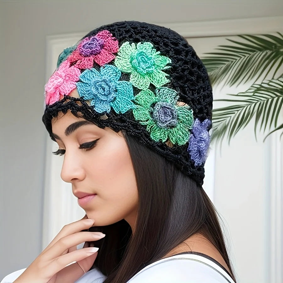 EtherealBe hand-knitted bohemian style beanie featuring colorful flower designs in vibrant hues
