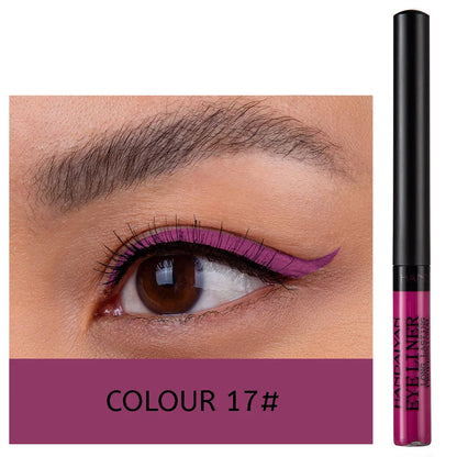 Vibrant UV light neon eyeliner pen in purple applied to eyelid for bold makeup looks