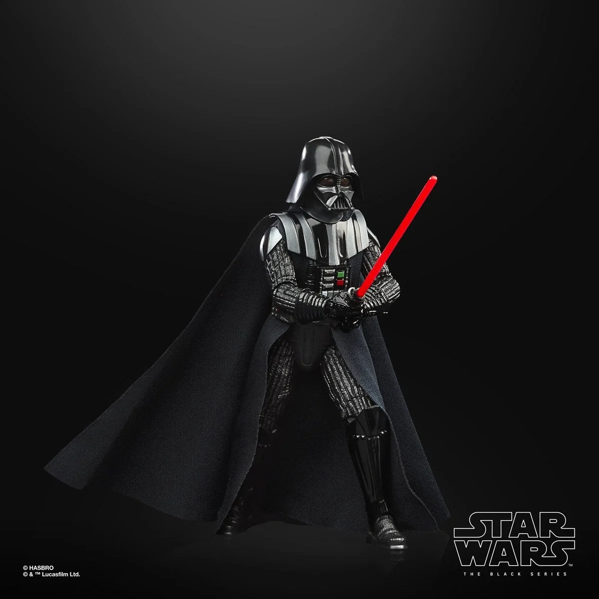Darth Vader black action figure with red lightsaber and cape posed on dark background Star Wars action figures for collectors