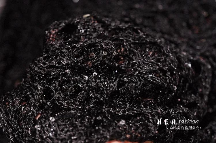 Close up black sequin fabric texture and shimmer detail for fall sequin dresses for women