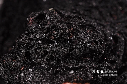 Close up black sequin fabric texture and shimmer detail for fall sequin dresses for women