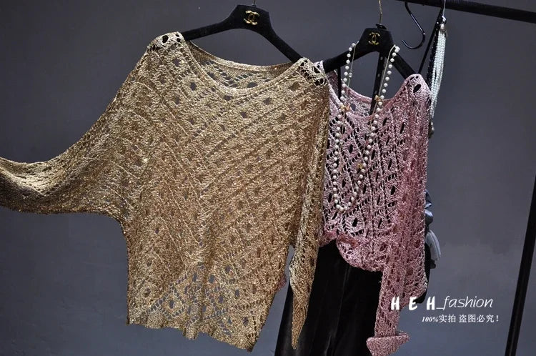 EtherealBe fall sequin dresses for women shown as gold and blush open knit sequin tops on hangers