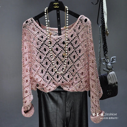 Styling fall sequin dresses for women with pink crochet lace sweater, pearl necklace, and black leather pants