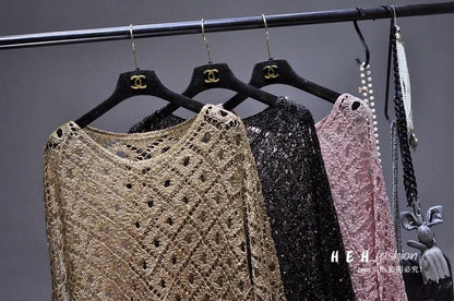 EtherealBe fall sequin dresses for women in gold black and blush pink lace knit hanging on a rack with pearl necklace