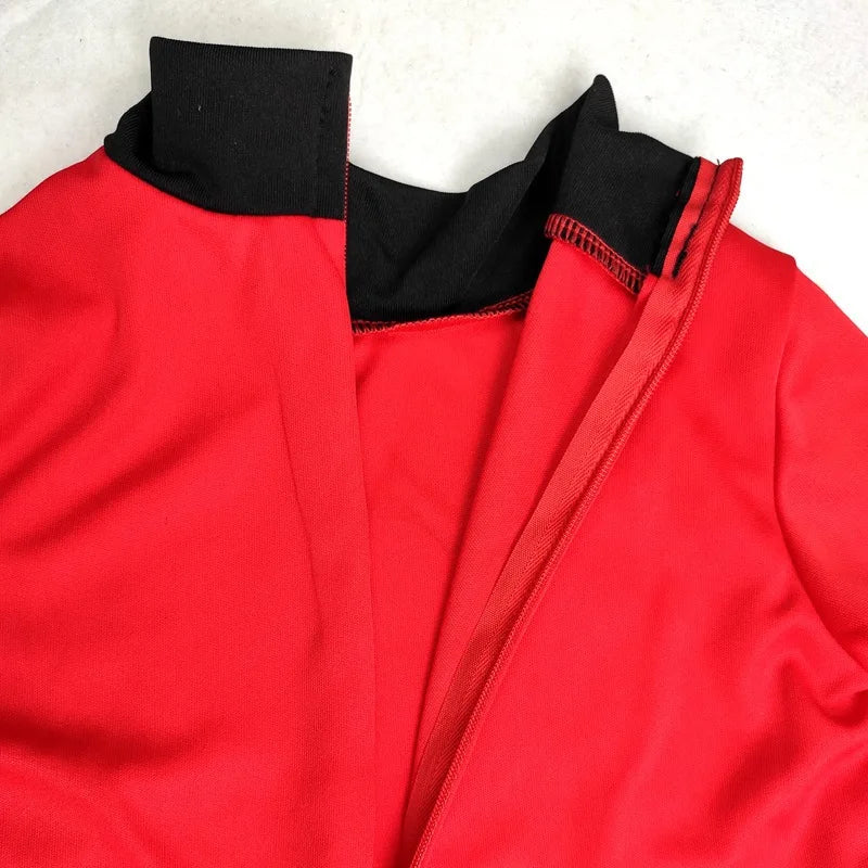 Close-up of kids Halloween Incredible costume featuring a vibrant red fabric and black accents