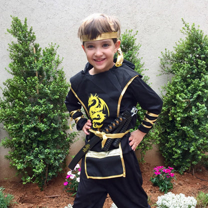 Kids samurai Halloween outfit featuring a black and gold design with accessories for little warriors