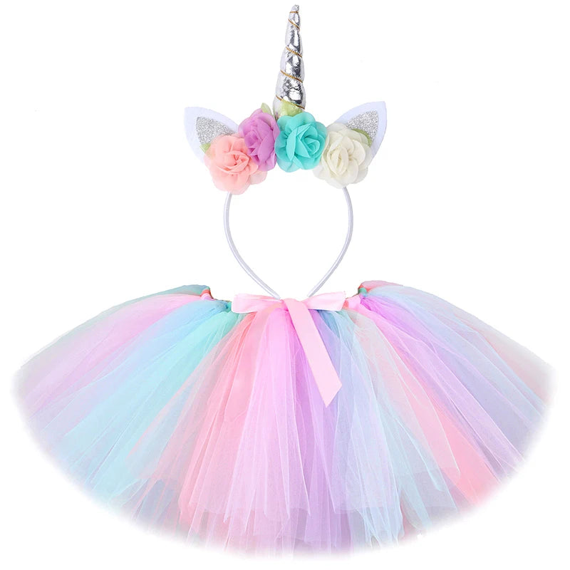 EtherealBe kids unicorn Halloween costume with wings featuring a colorful tulle skirt and unicorn headband