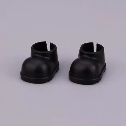Black rubber shoes designed for Labubu doll clothes, perfect for stylish doll outfits