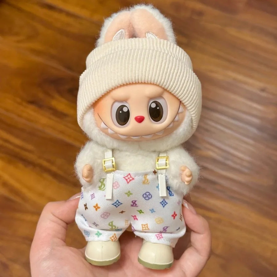 Labubu doll clothes featuring a cute bunny outfit with overalls and a cozy beanie
