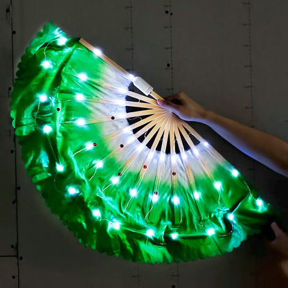 LED butterfly wing cloak in vibrant green with illuminated lights for stunning performances
