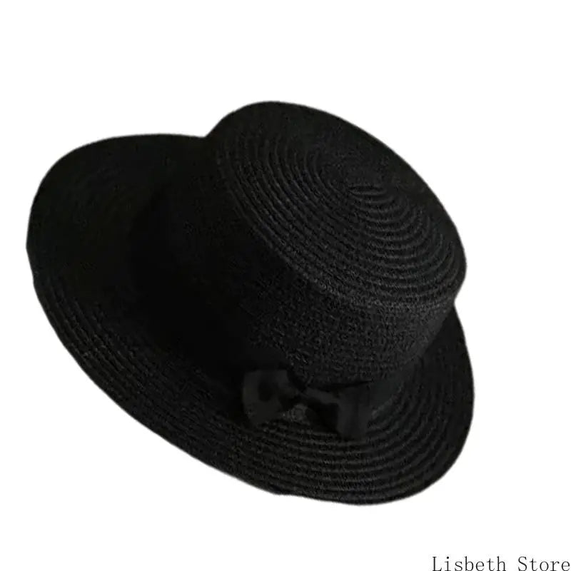 EtherealBe creative ladies hat with secure fit, featuring a stylish black design and bow detail.