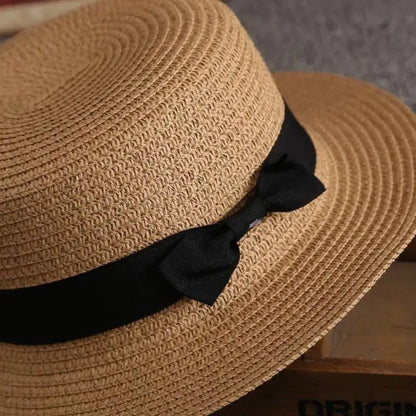 EtherealBe creative ladies hat with secure fit featuring a stylish black ribbon band
