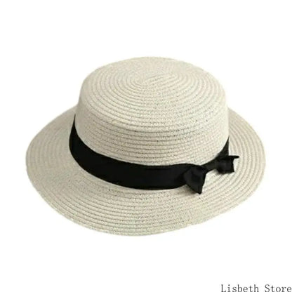 EtherealBe creative ladies hat with secure fit featuring a classy black ribbon detail
