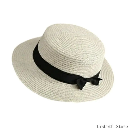 EtherealBe creative ladies hat with secure fit, featuring a stylish black ribbon and woven design