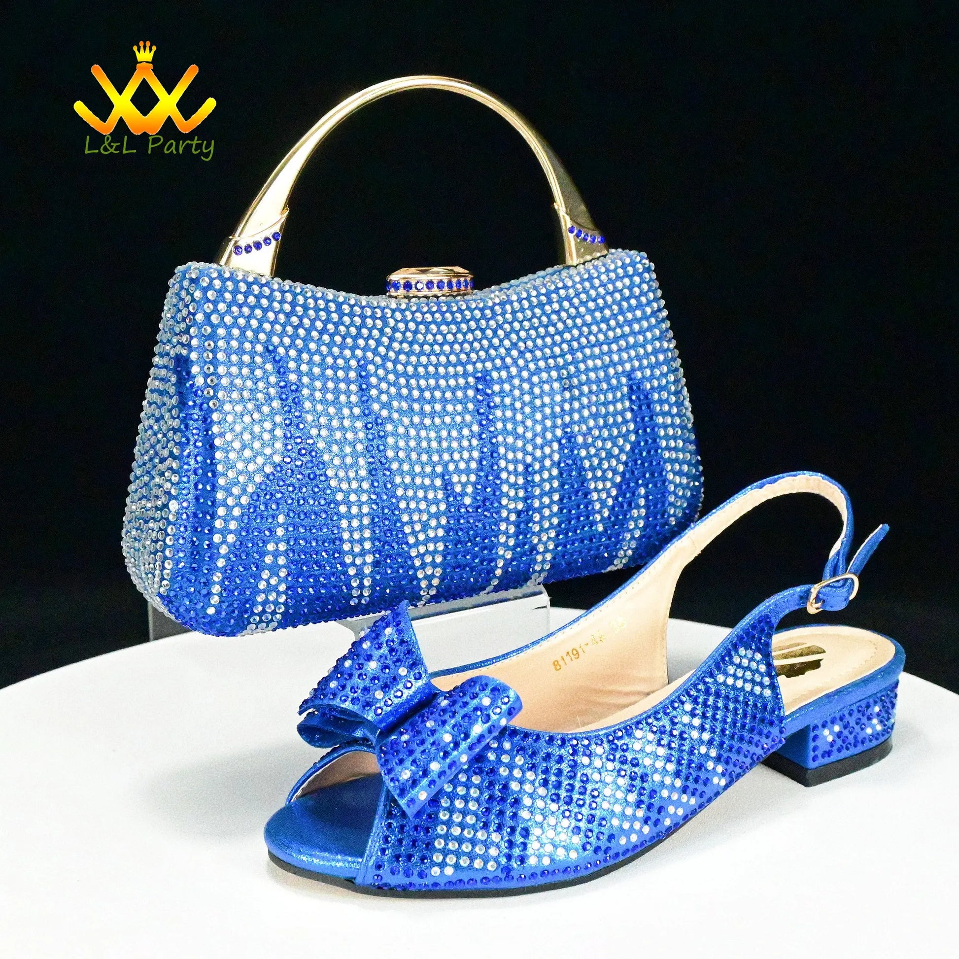 Sparkling blue rhinestone slingback shoe with bow and matching crystal evening handbag Fashionable shoes and bag set.