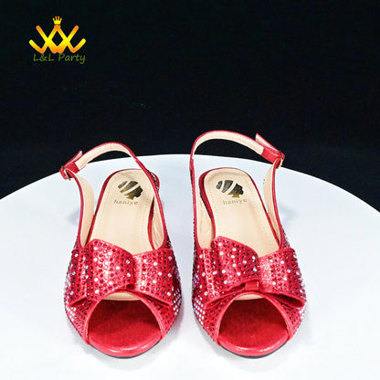Red rhinestone slingback peep toe sandals on white display by EtherealBe Fashionable shoes and bag set.