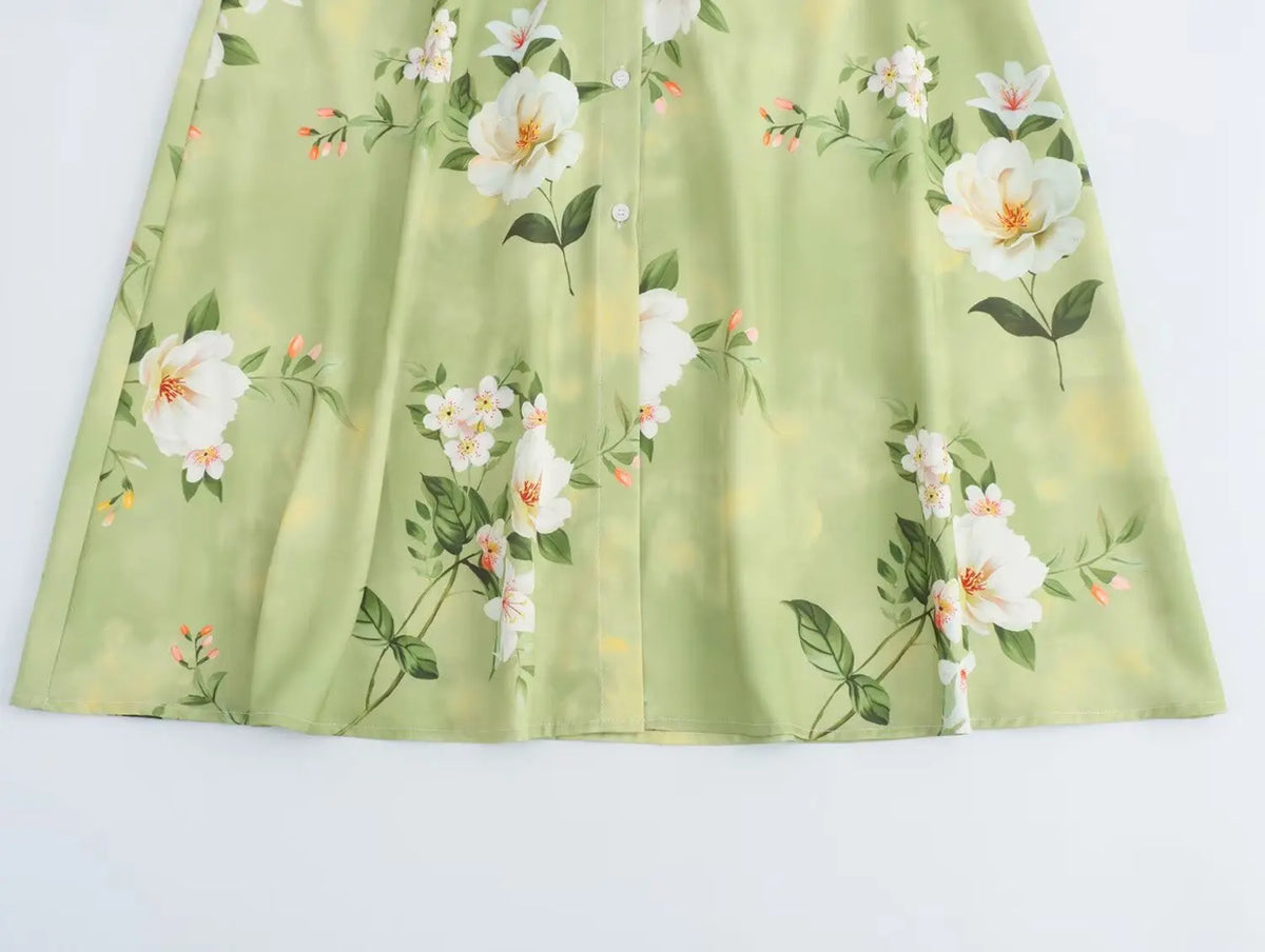 Light green long sleeve spring floral midi dress with beautiful flower patterns and button details
