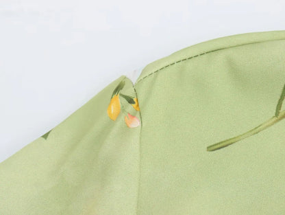 Detail of the long sleeve spring floral midi dress featuring soft fabric and vibrant floral patterns