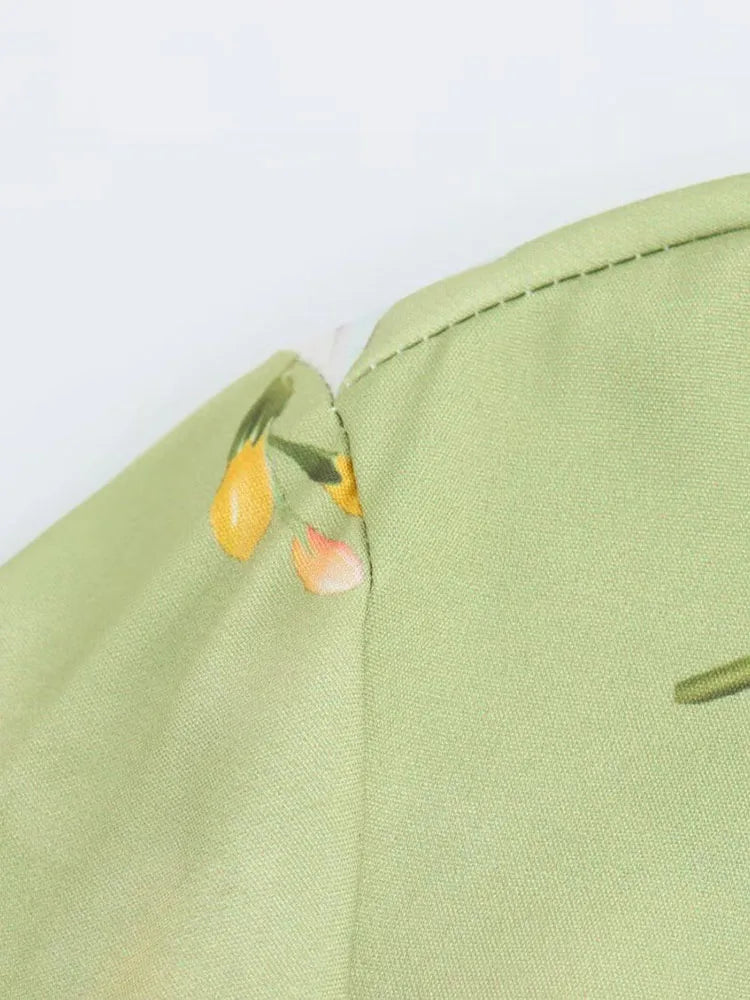 Close-up of the fabric showing the detail of the long sleeve spring floral midi dress by EtherealBe