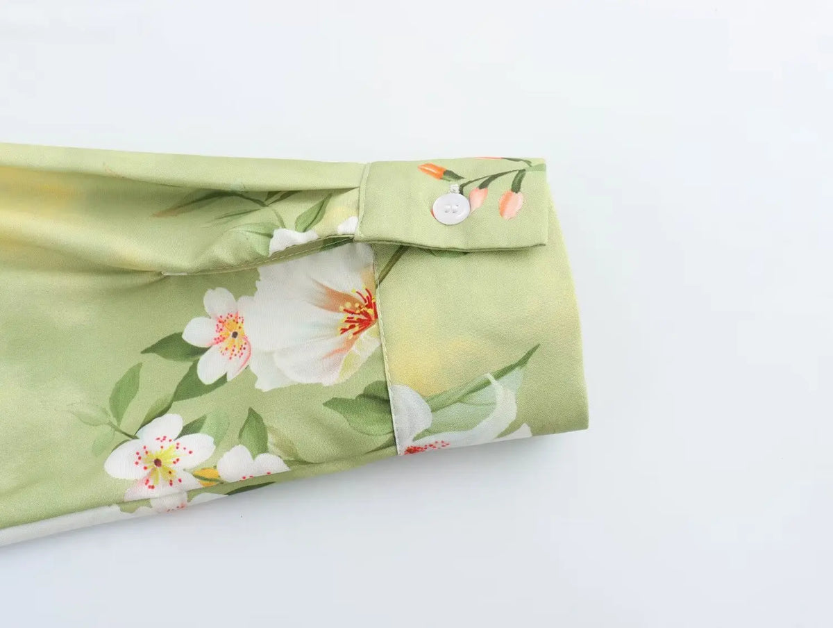 EtherealBe long sleeve spring floral midi dress sleeve detail featuring vibrant floral pattern