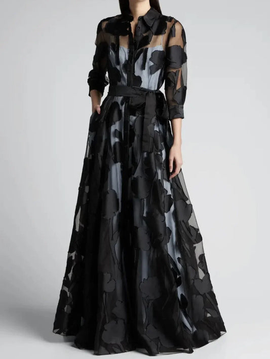 EtherealBe elegant polka dot maxi dress in black sheer overlay with waist tie and long sleeves